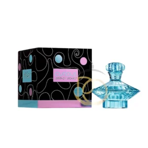 Curious Britney Spears: Frasco azul celeste con atomizador rosa y dijes. Fragancia Floral Blanca, fresca y clásica.