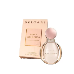perfume Rose Goldea Bvlgari en tonos dorados y rosados, mostrando la tapa circular inspirada en un reloj.
