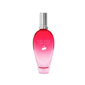 Frasco de Cherry In Japan Escada rodeado de flores de cerezo, evocando frescura y verano japonés.