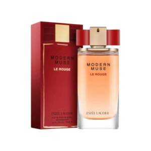 Frasco de Modern Muse Le Rouge con su elegante lazo rojo, evocando pasión, lujo y feminidad audaz.