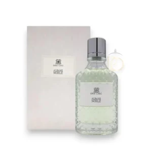 Frasco de perfume Albane Noble Gris Chic EDP en cristal gris elegante sobre un fondo sobrio moderno.