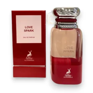 Frasco de perfume Love Spark EDP en cristal rosado con detalles brillantes sobre un fondo elegante.