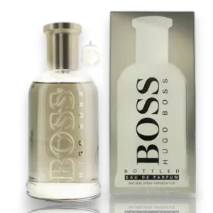 Imponente frasco de 200ml de Boss Bottled EDP con vidrio ahumado y tapón en tono bronce elegante.