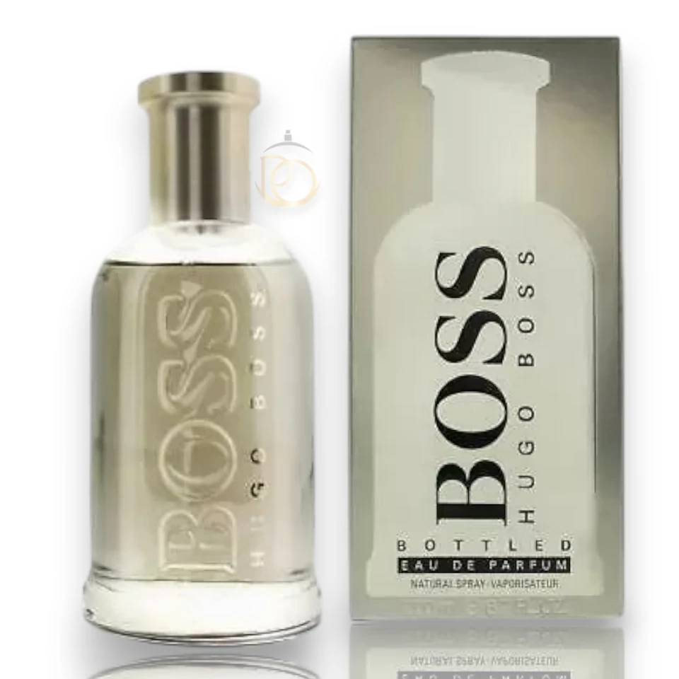 Imponente frasco de 200ml de Boss Bottled EDP con vidrio ahumado y tapón en tono bronce elegante.