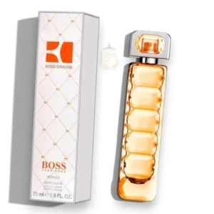 Frasco con relieve de gemas de Boss Orange Edt sobre un fondo cálido y luminoso de tonos anaranjados.