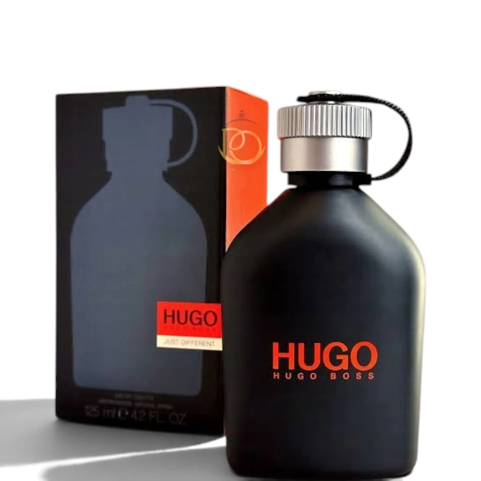 Perfume Hugo Just Different EDT de Hugo Boss para hombre en frasco negro sobre fondo elegante