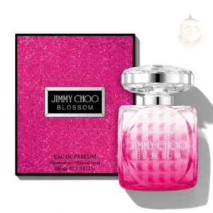 Elegante frasco rosado del perfume Blossom EDP sobre un fondo luminoso y fresco.